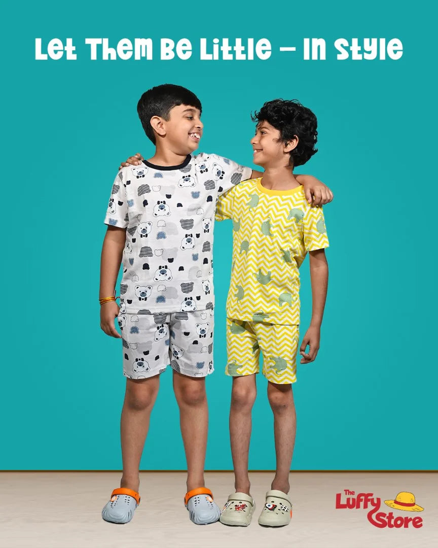 Two children wearing pajamas with a blue background and 'Luffy Store' branding.
