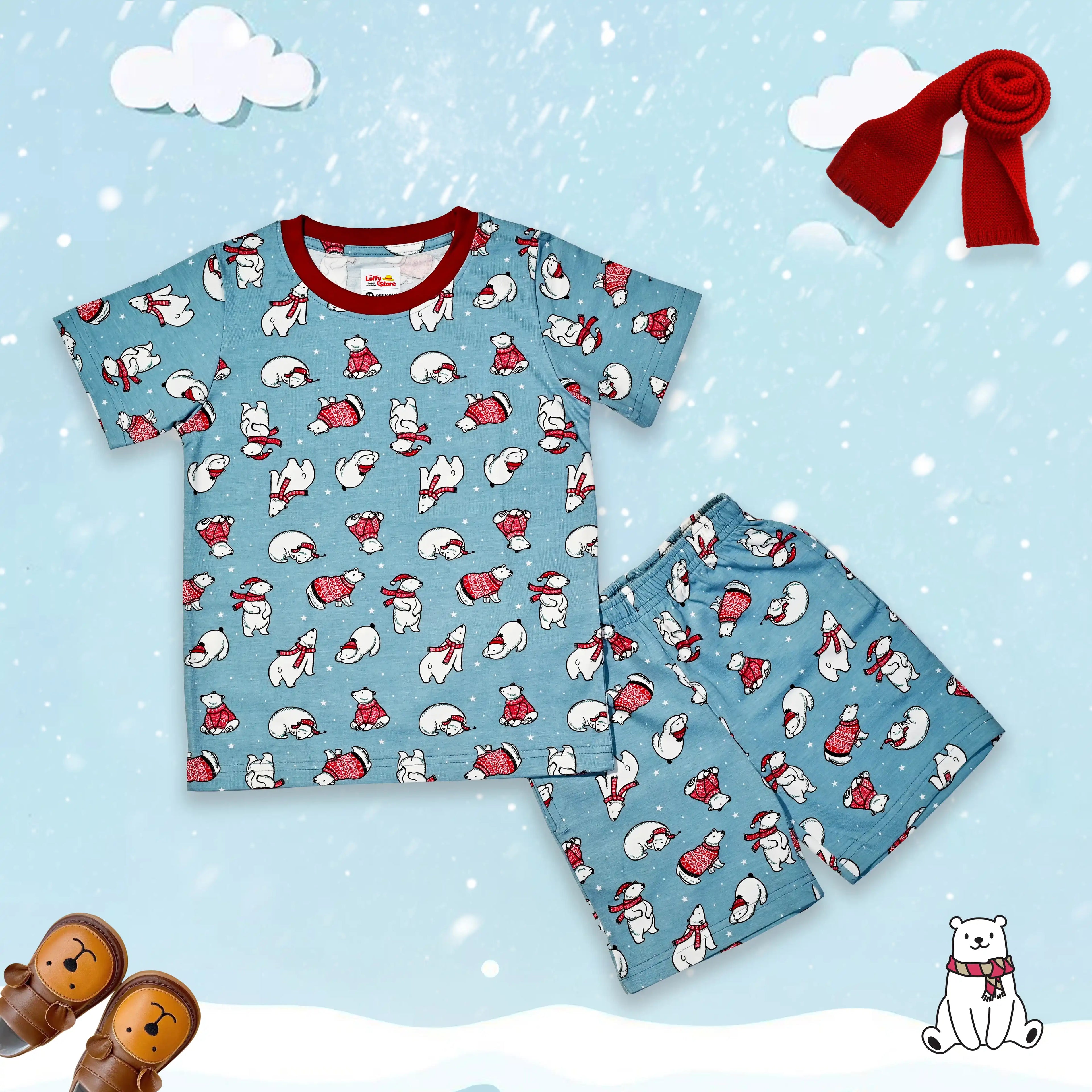 Children's pajama set with bear pattern on a snowy background