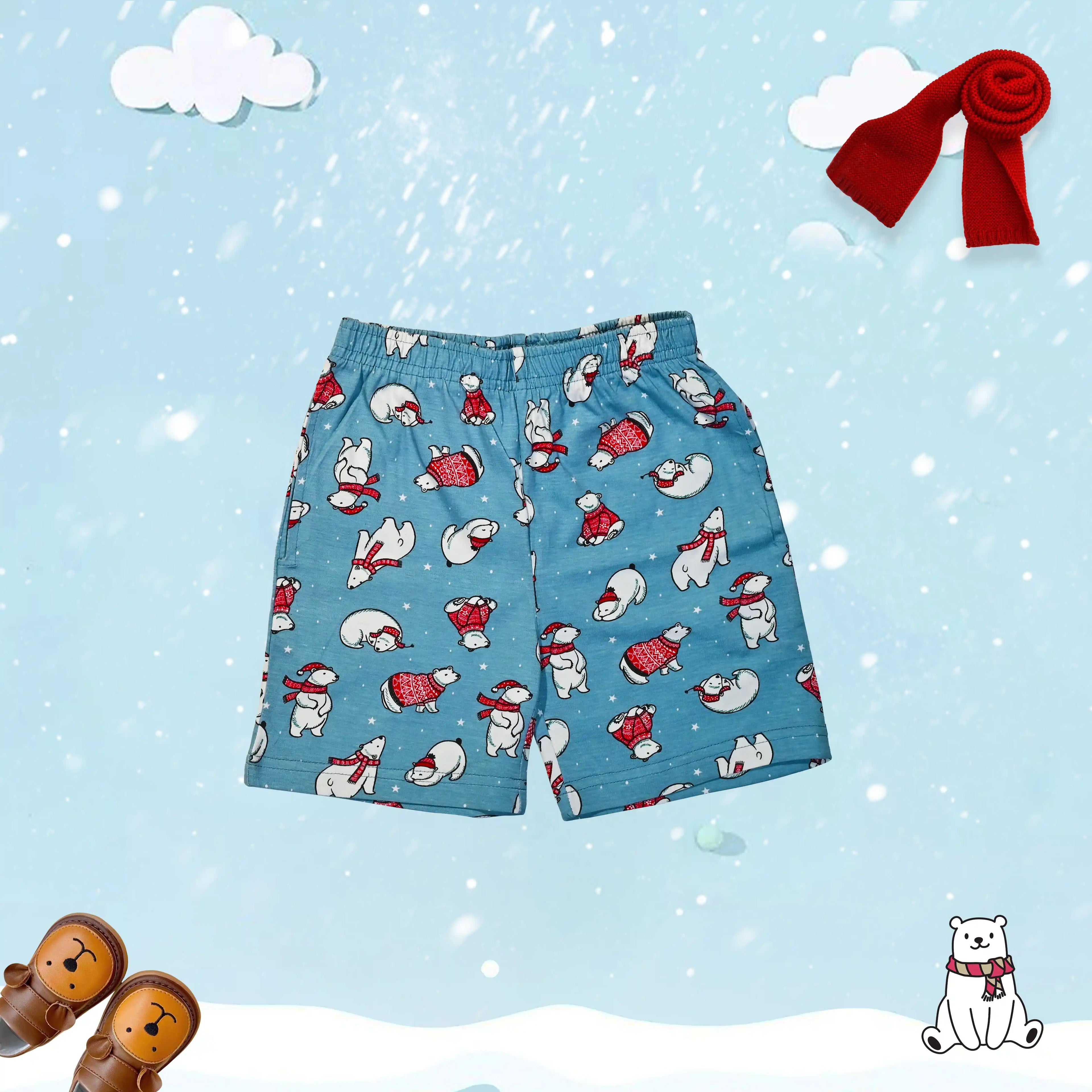 Blue shorts with winter-themed pattern on a snowy background