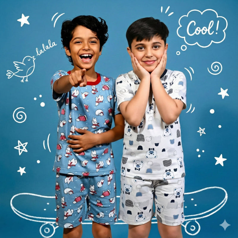 Two children wearing patterned pajamas on a blue background with decorative elements.