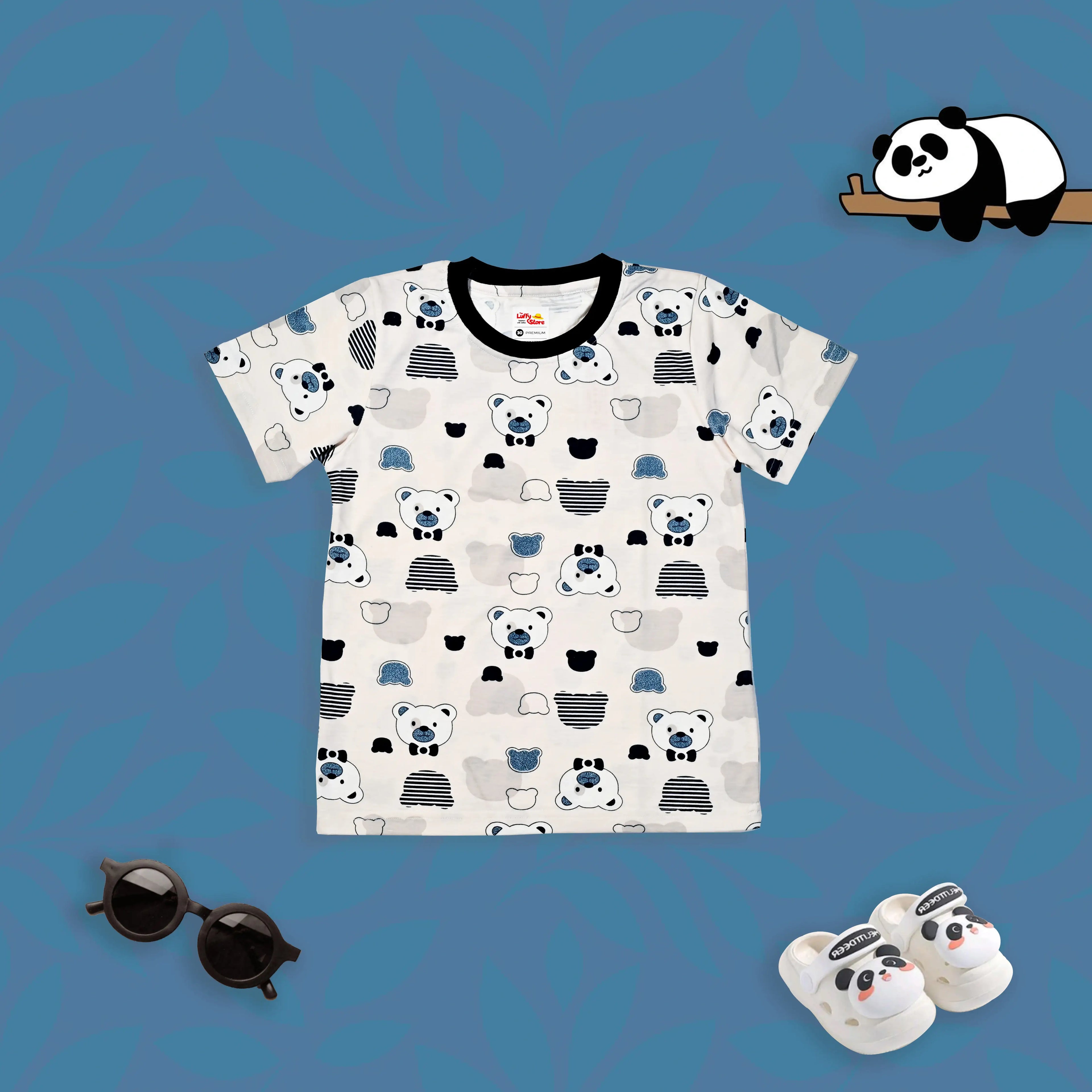 Children's t-shirt with panda pattern, sunglasses, and slippers on a blue background