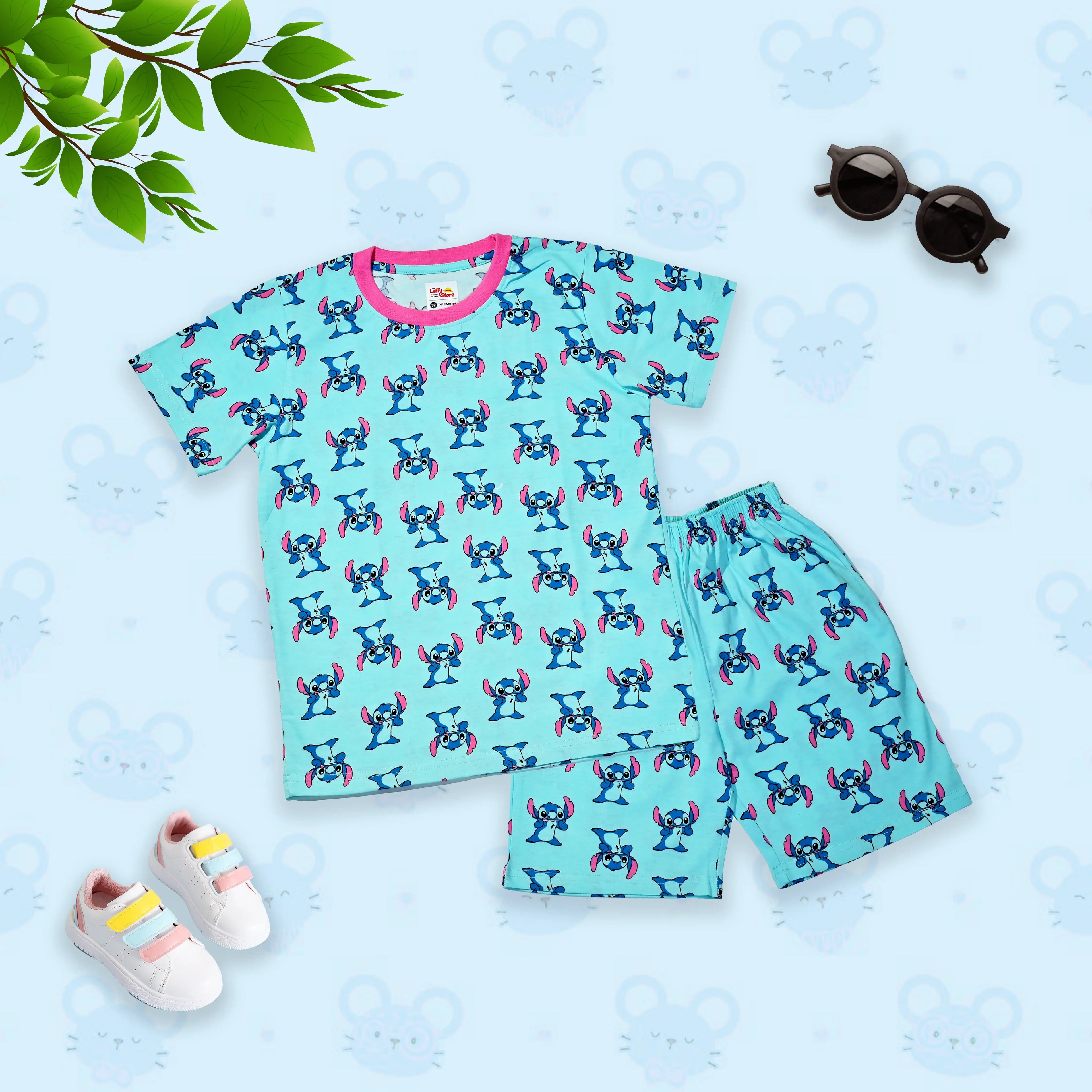 Children's pajama set with cartoon pattern on a light blue background