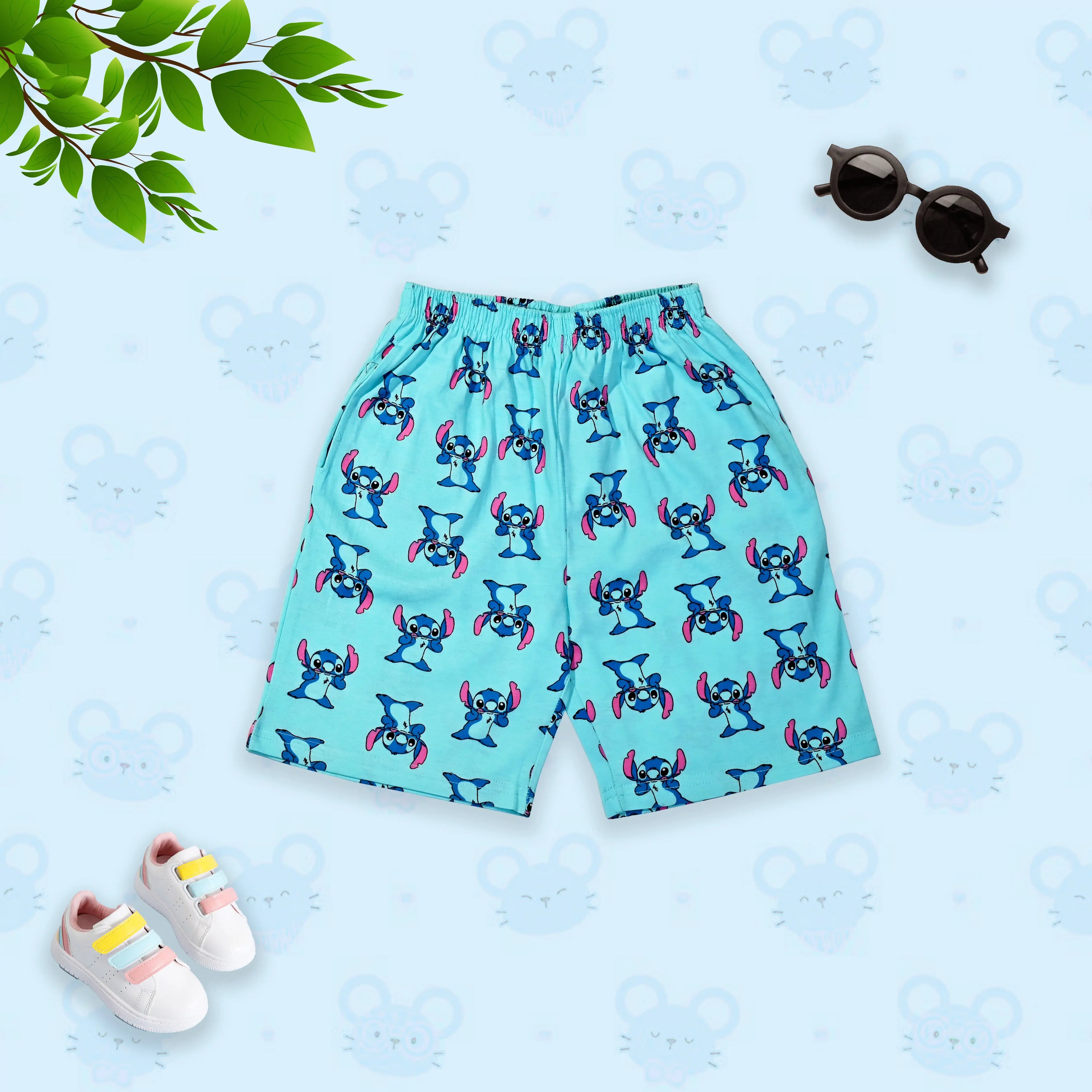 Teal shorts with cartoon character pattern on a light blue background