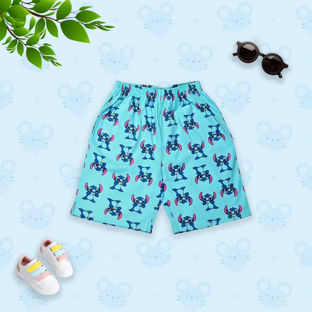 Teal shorts with cartoon character pattern on a light blue background with sunglasses and shoes.