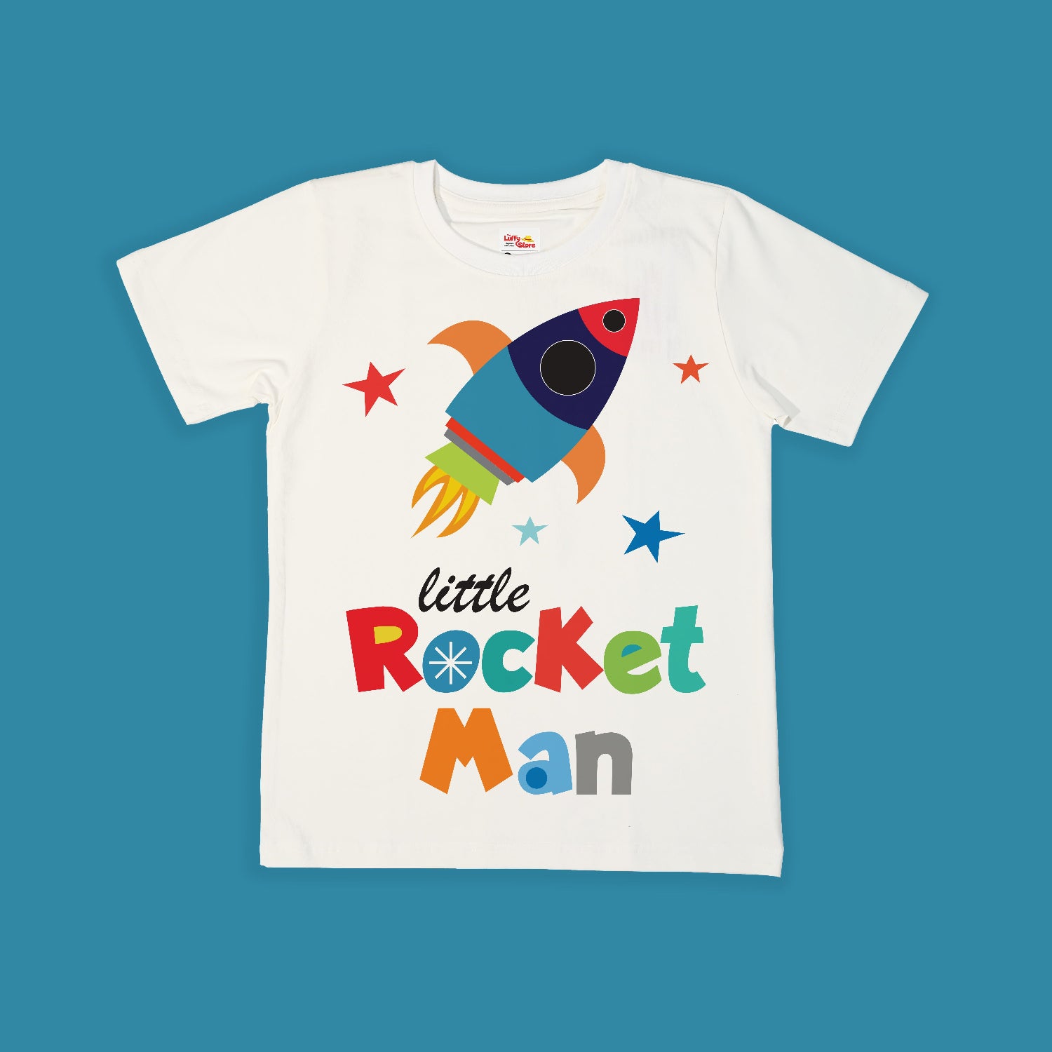 White t-shirt with colorful rocket design and text on a blue background