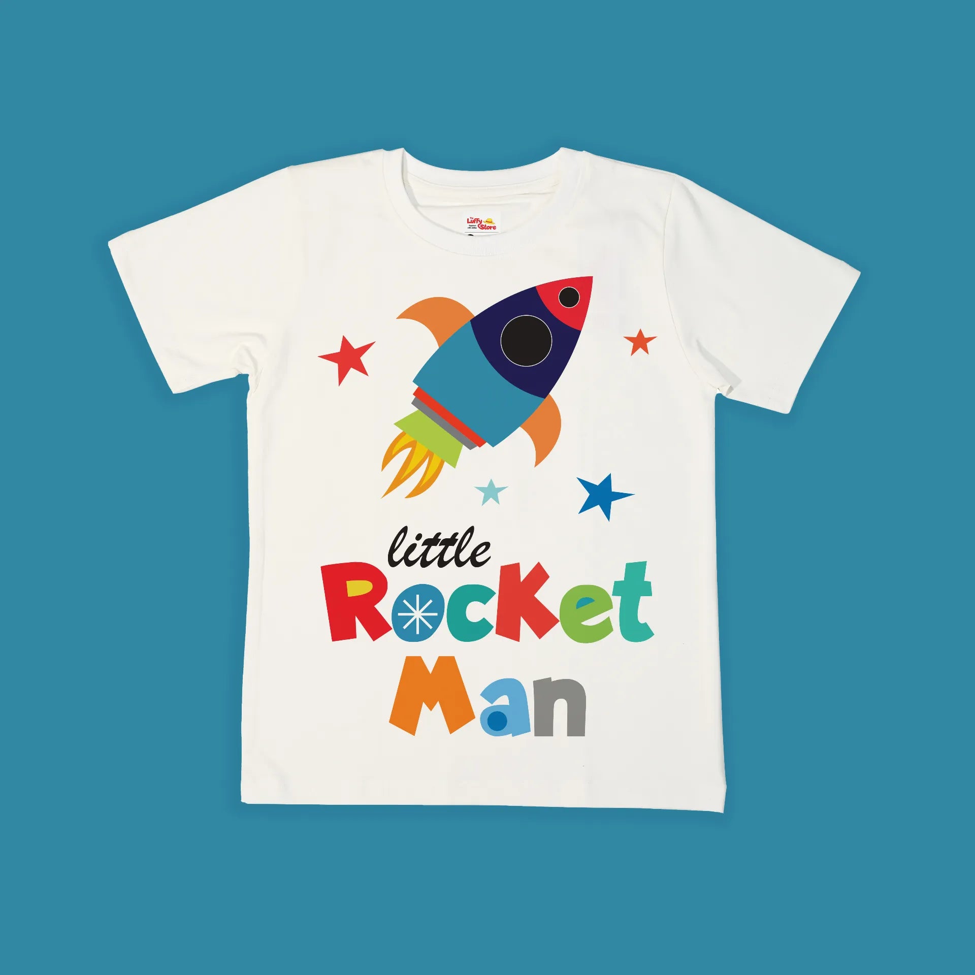 White t-shirt with colorful rocket design and text on a blue background